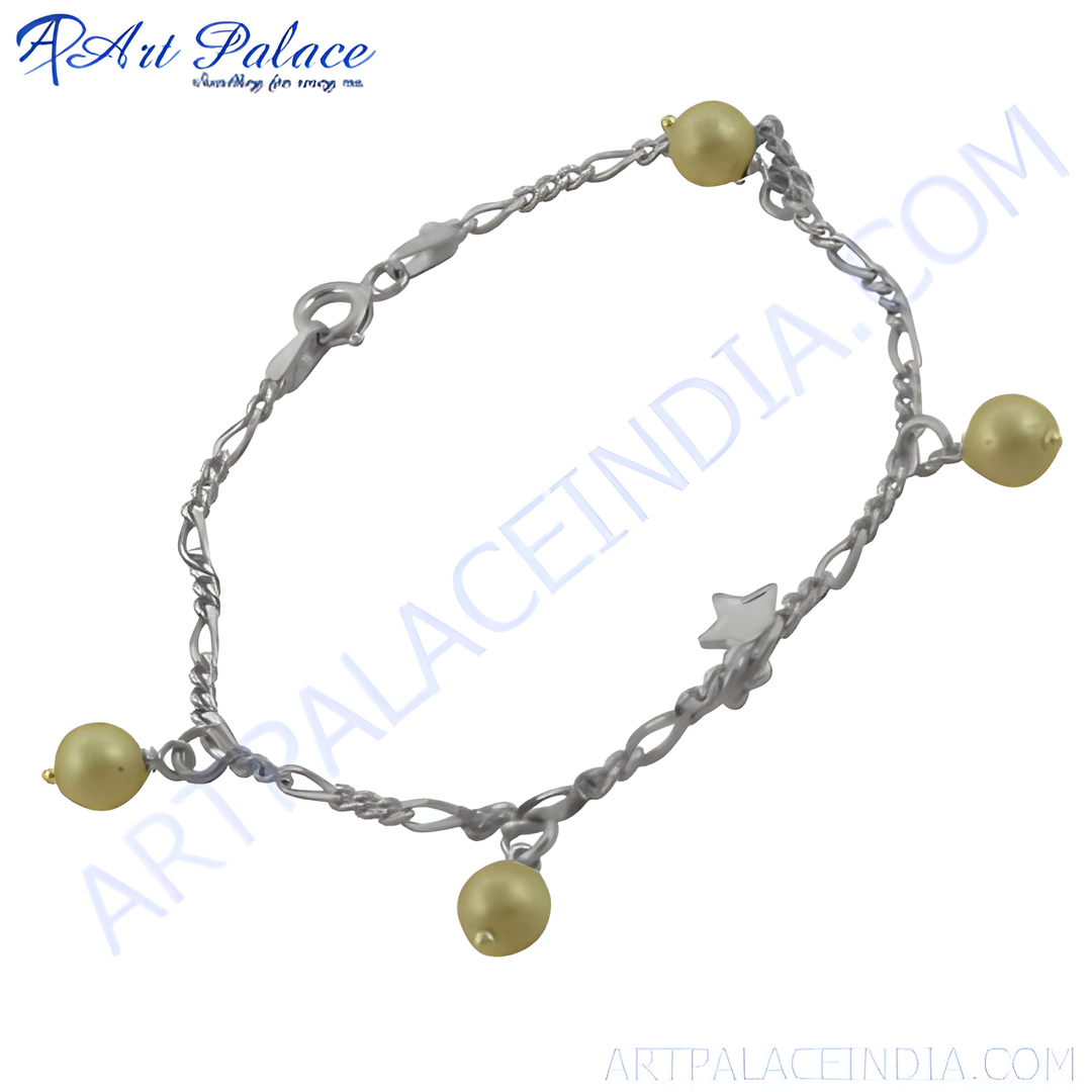 Sterling silver charm bracelet with pearl accents and a star charm.