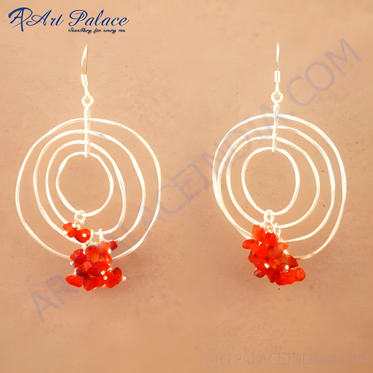 925 sterling silver dangle earrings featuring a multi circle design and vibrant red gemstones