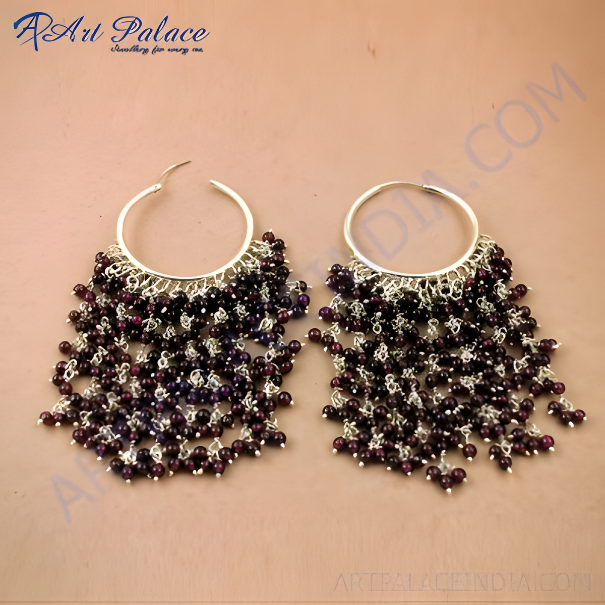 Silver hoop earrings with a cascade of dark red garnet beads, perfect for women