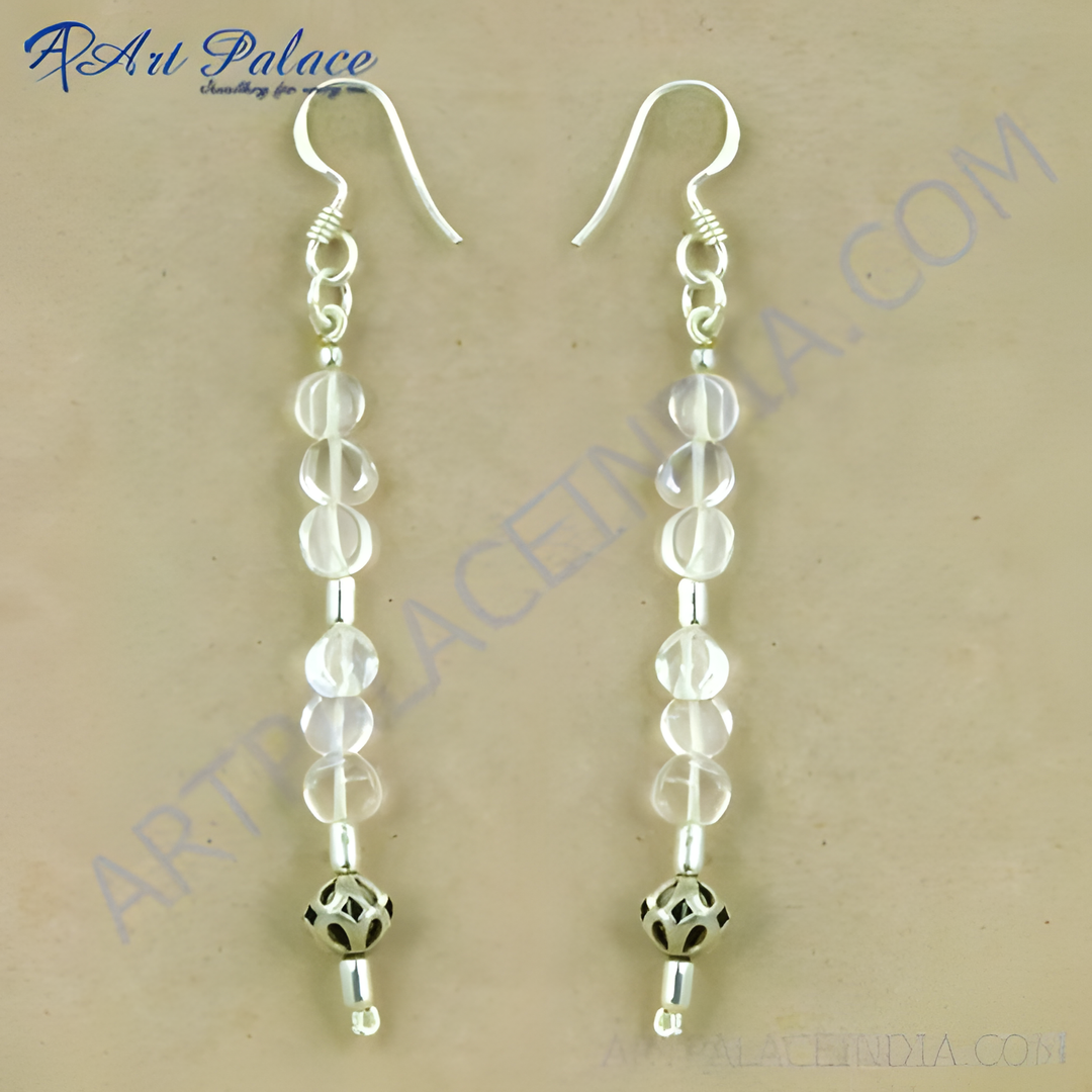 925 sterling silver drop earrings with clear faceted stones, silver hooks, and a detailed ball at the end.
