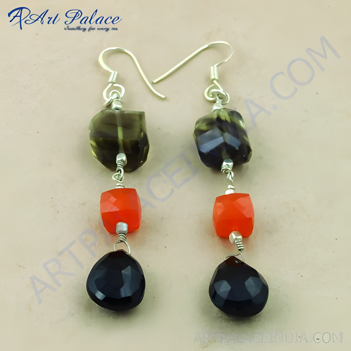 Silver drop earrings featuring black teardrop, orange cube, and olive green gemstones, perfect for any occasion