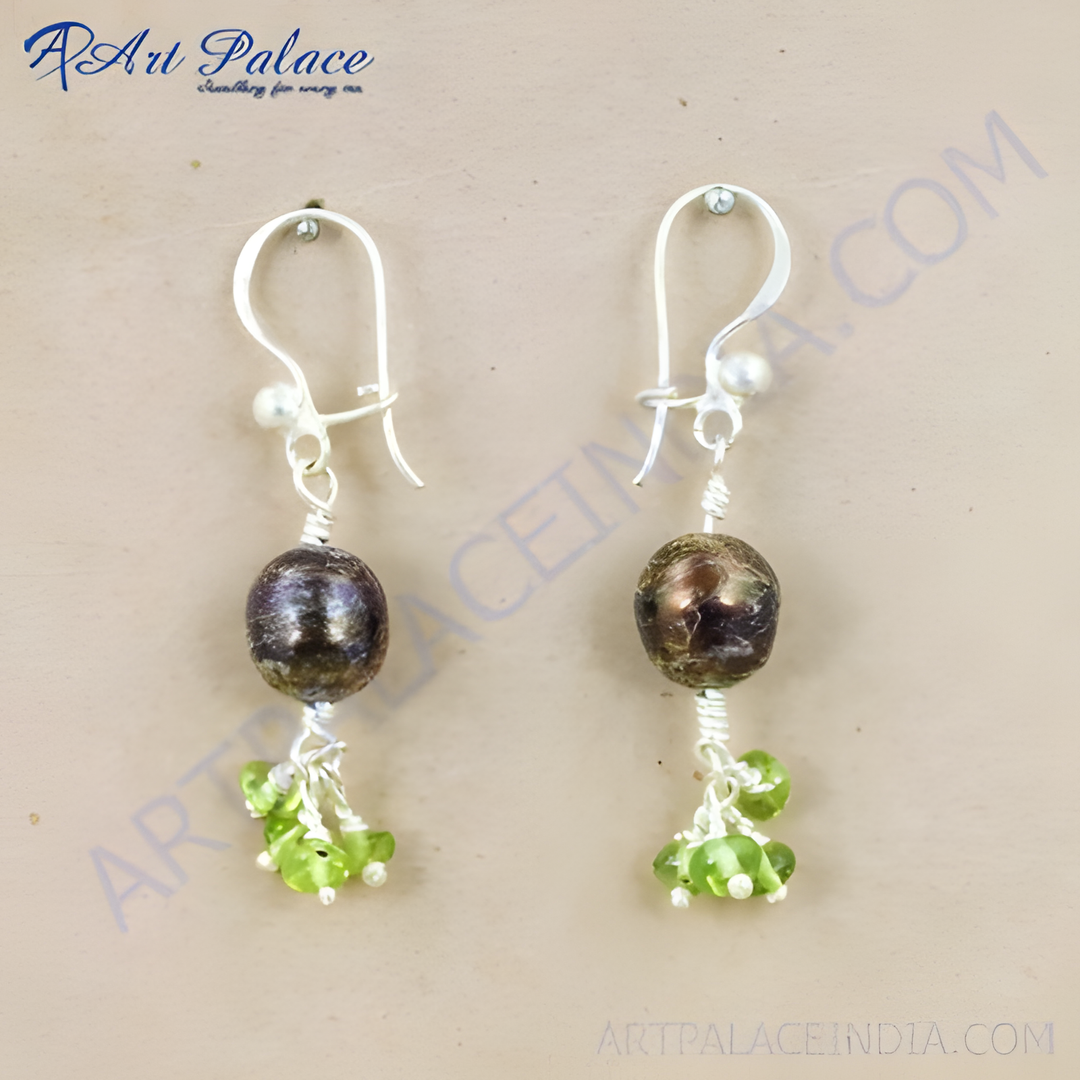 Silver drop earrings featuring dark pearls and green peridot gemstones.