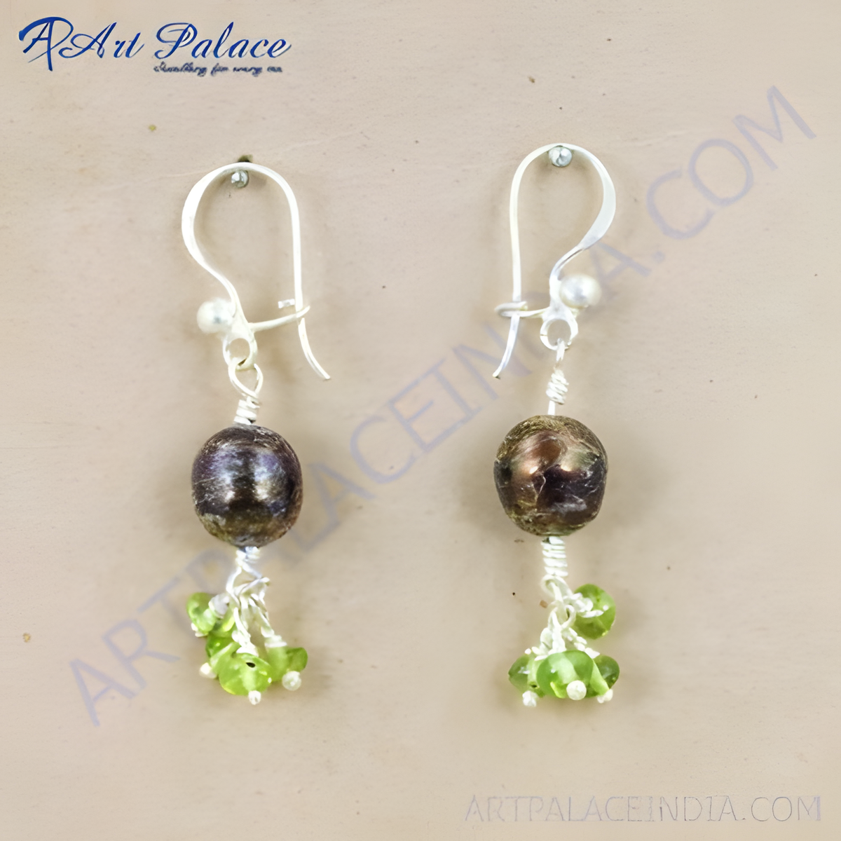 Silver drop earrings featuring dark pearls and green peridot gemstones