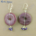 Load image into Gallery viewer, Sterling silver dangle earrings featuring a donut-shaped pink stone and small amethyst beads.
