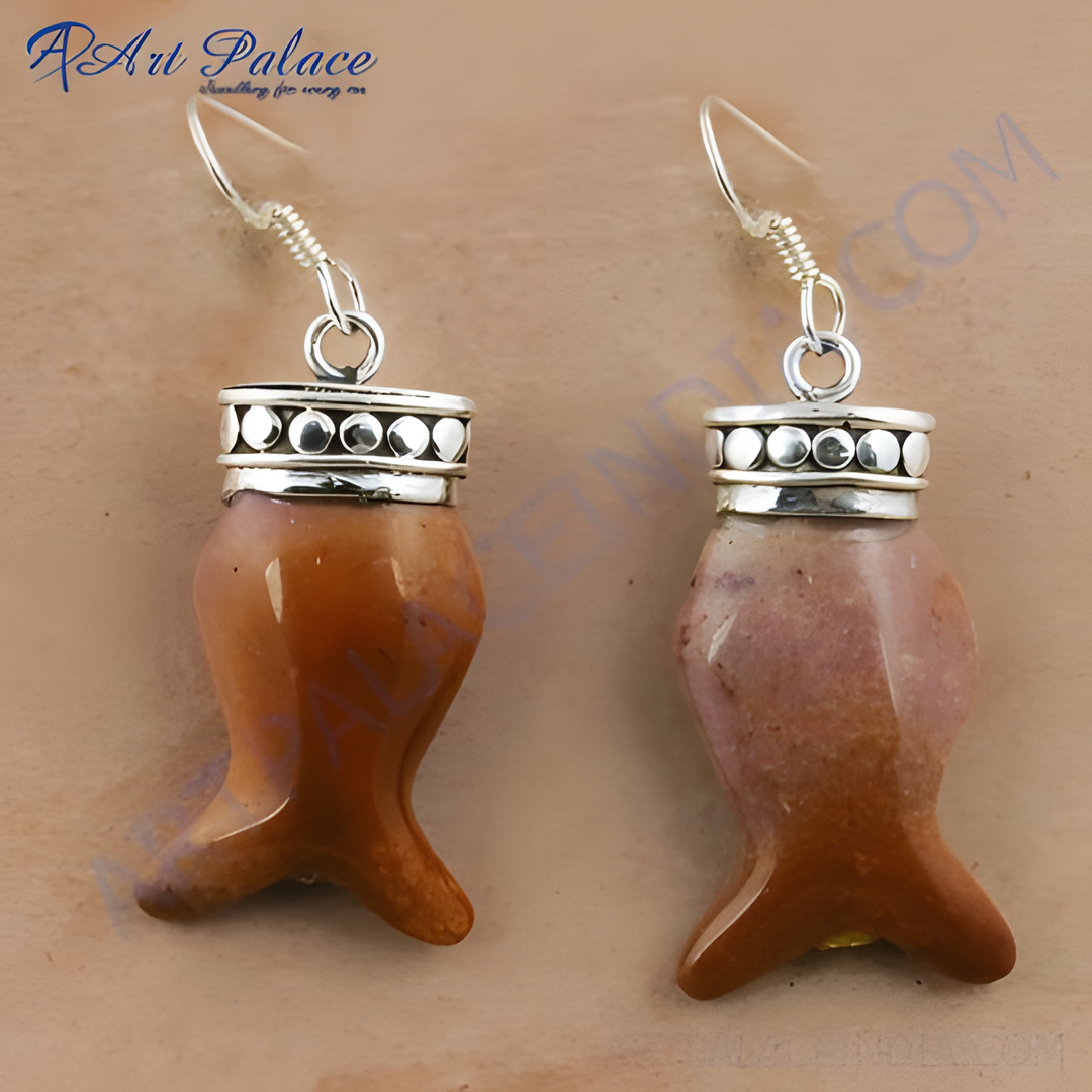 Sterling silver dangle earrings featuring fish shaped gemstones in shades of brown.