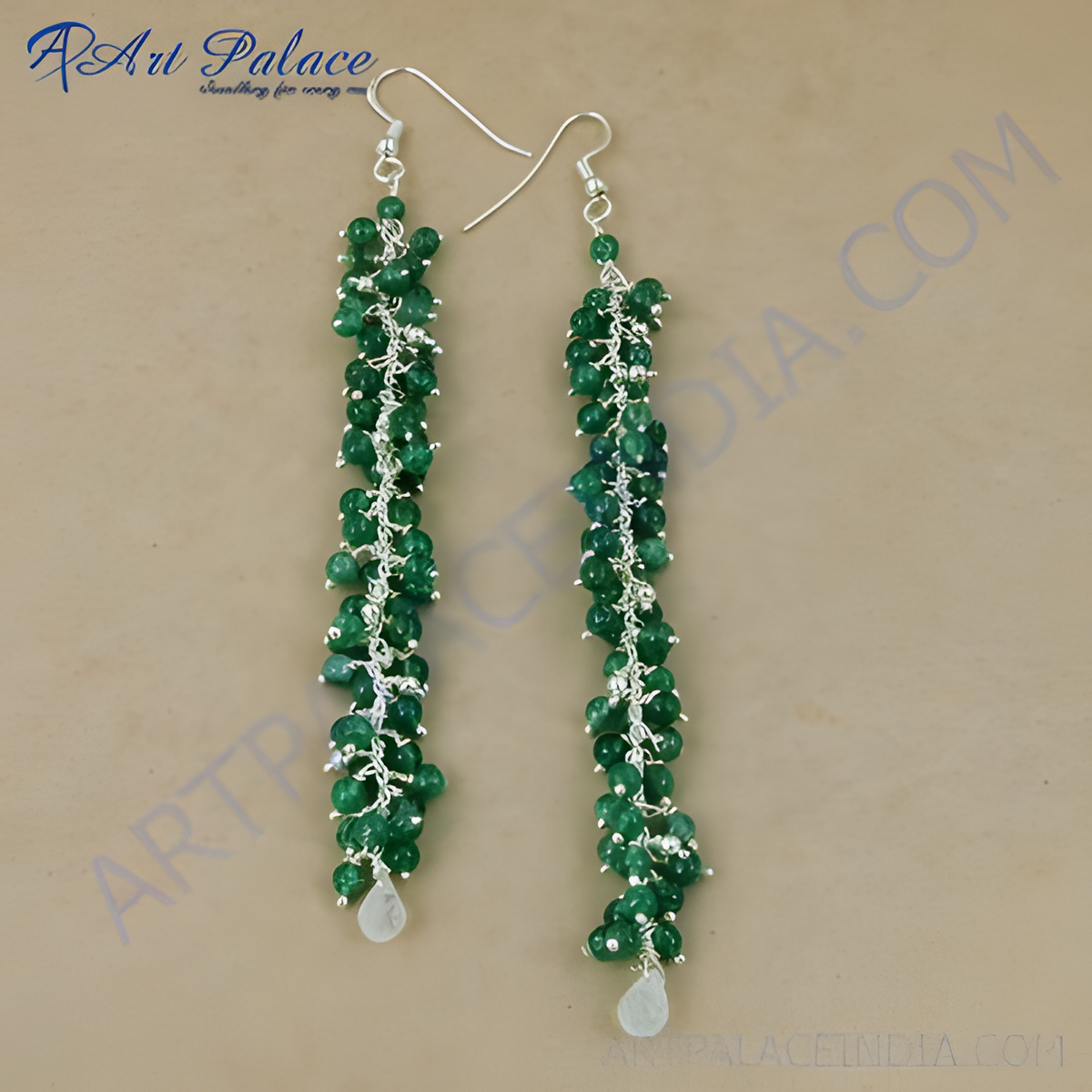 Emerald drop earrings crafted with 925 sterling silver and vibrant green emerald beads