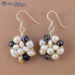 Load image into Gallery viewer, Sterling silver dangle earrings with a cluster of white, cream, and dark gray freshwater pearls.
