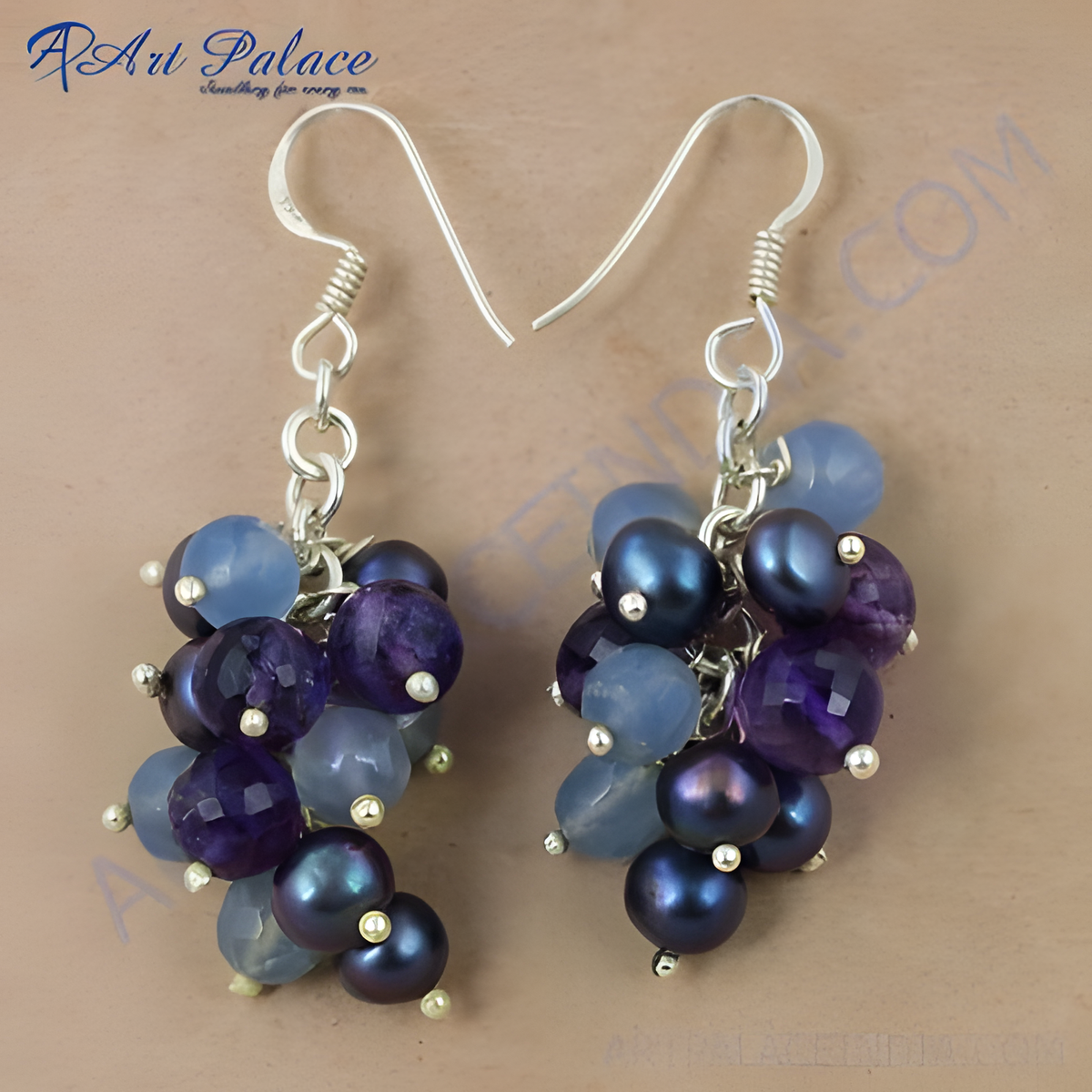 Silver cluster earrings featuring pearls and blue and purple gemstones, elegant fashion jewelry