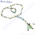 将图像加载到图库查看器中， Aquamarine gemstone beaded necklace with light blue and green stones on a white background
