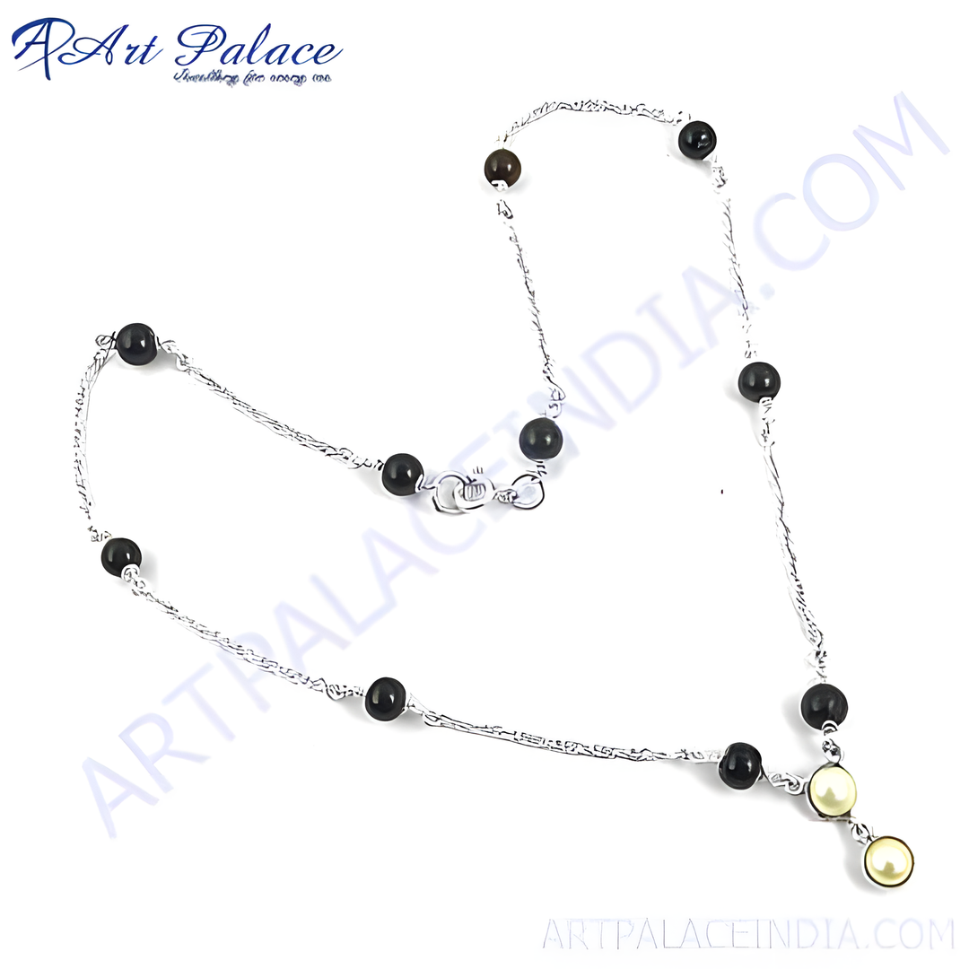 Sterling silver beaded necklace with black onyx and pearl-colored beads