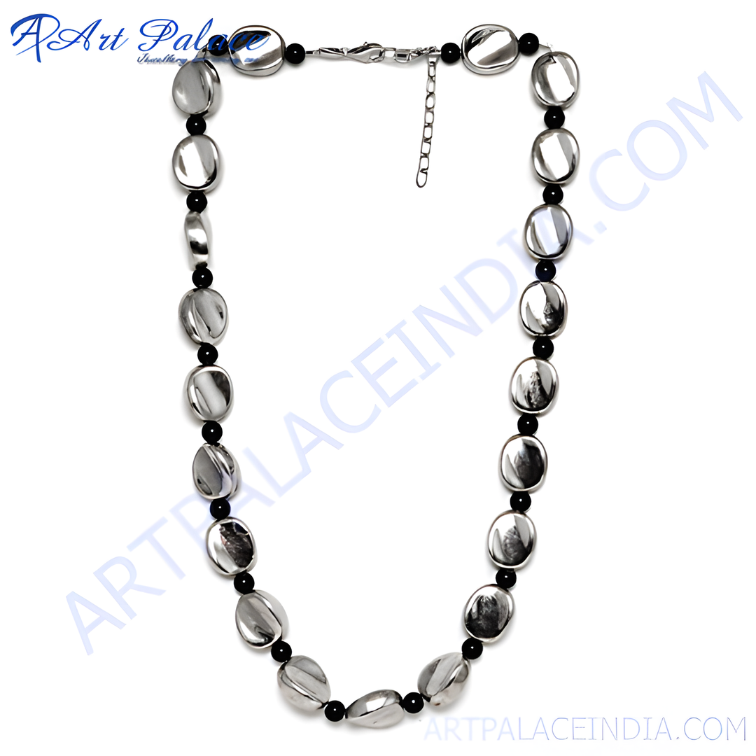 Silver bead necklace with black beads, a classic and elegant jewelry piece