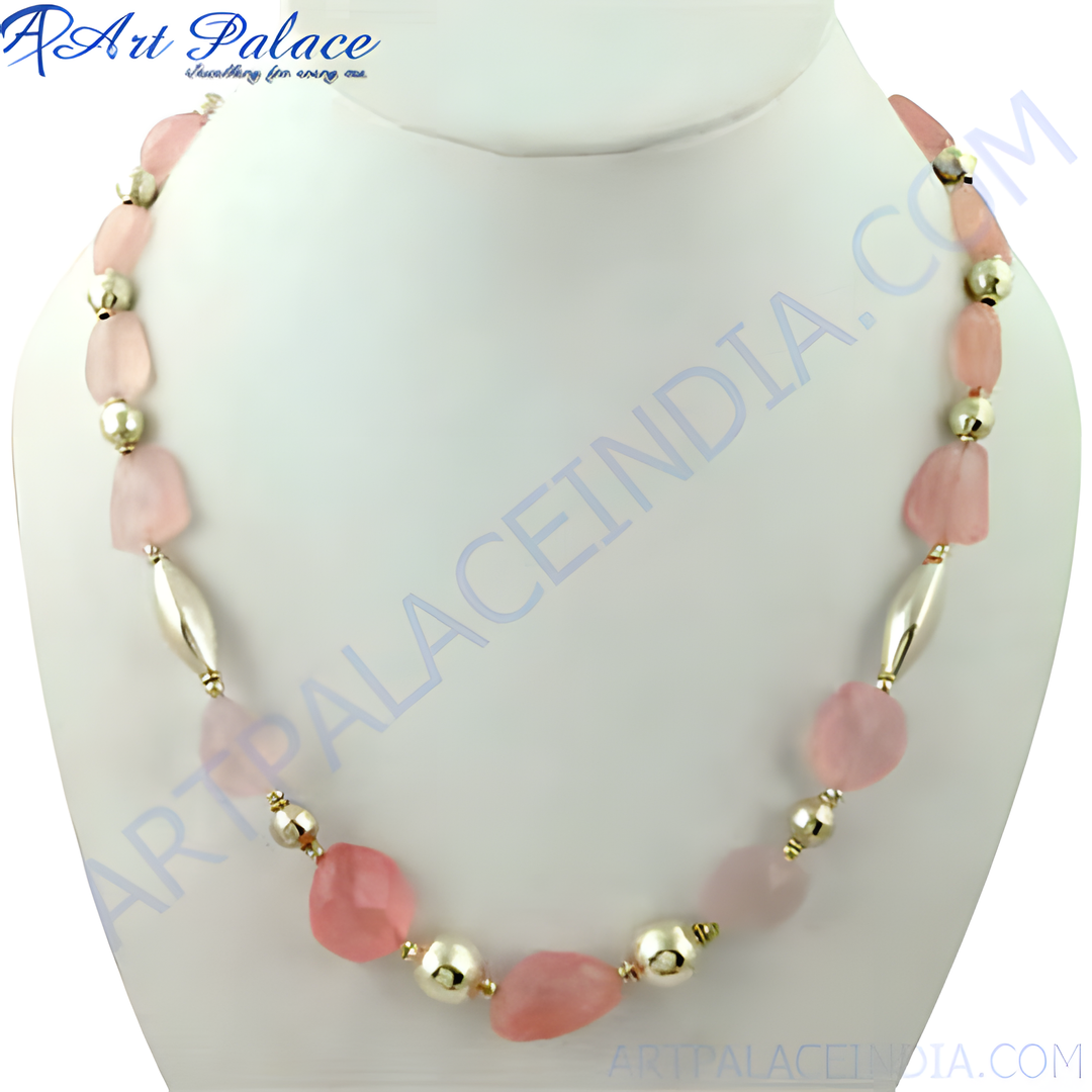 Pink rose quartz beaded necklace with gold plating accents, displayed on a mannequin, women's fashion jewelry.