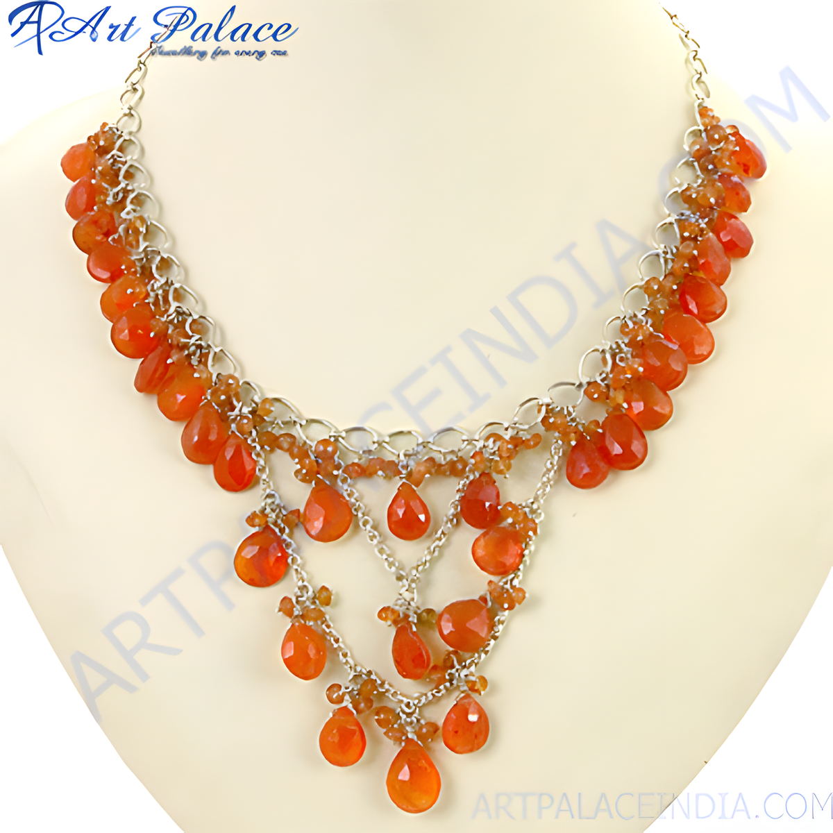Sterling silver necklace with vibrant orange carnelian gemstone drops, a stunning jewelry piece