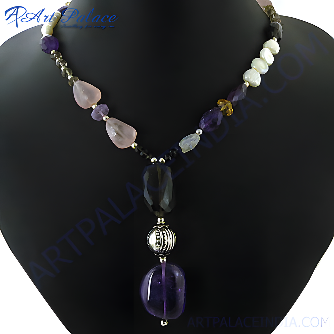 A stunning gemstone beaded necklace featuring purple, pink, and clear stones on a black display.