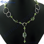 将图像加载到图库查看器中， 925 sterling silver peridot gemstone necklace on a black mannequin, featuring a unique and modern design
