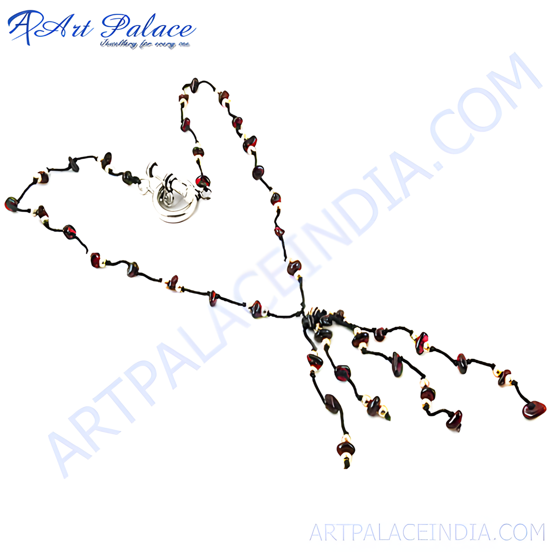 Garnet beaded necklace with a unique design, showcasing red gemstones on a black cord.