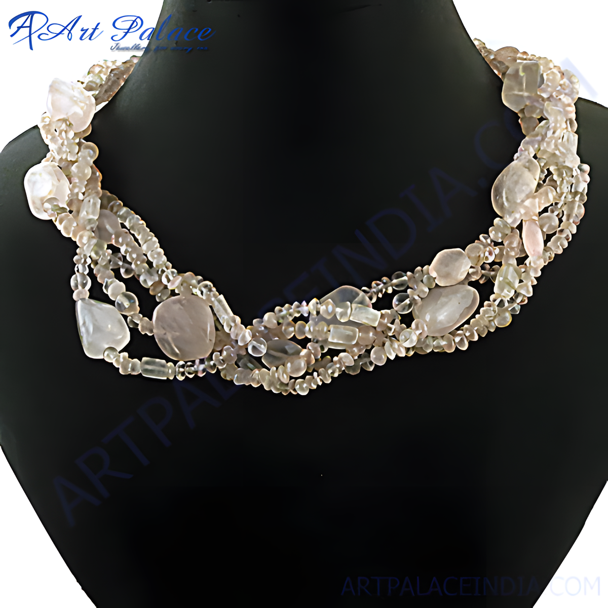 Multi strand rose quartz beaded necklace with large oval and round beads on a black display