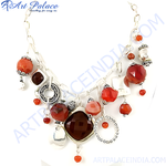 Load image into Gallery viewer, Silver necklace with carnelian gemstones. Featuring red gemstones and silver chain.
