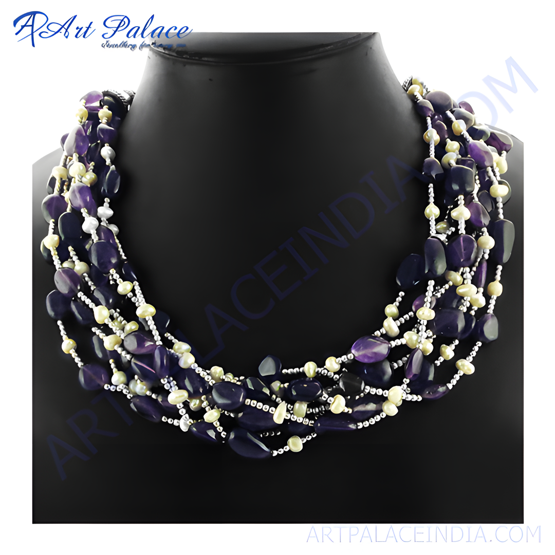 Multi-strand amethyst and pearl beaded necklace on a black mannequin, showing off a deep purple gemstone.