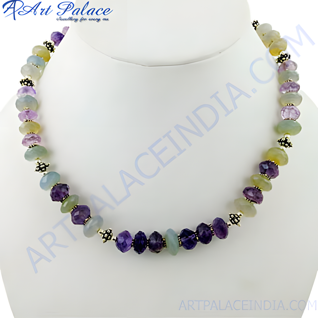 A beaded necklace featuring purple and green gemstones strung together on a necklace.