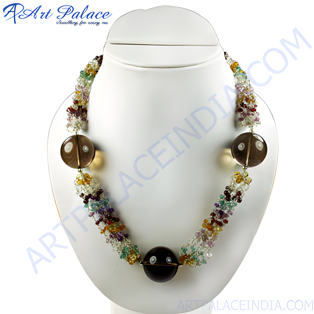 A colorful beaded statement necklace with various gemstones displayed on a white jewelry bust.