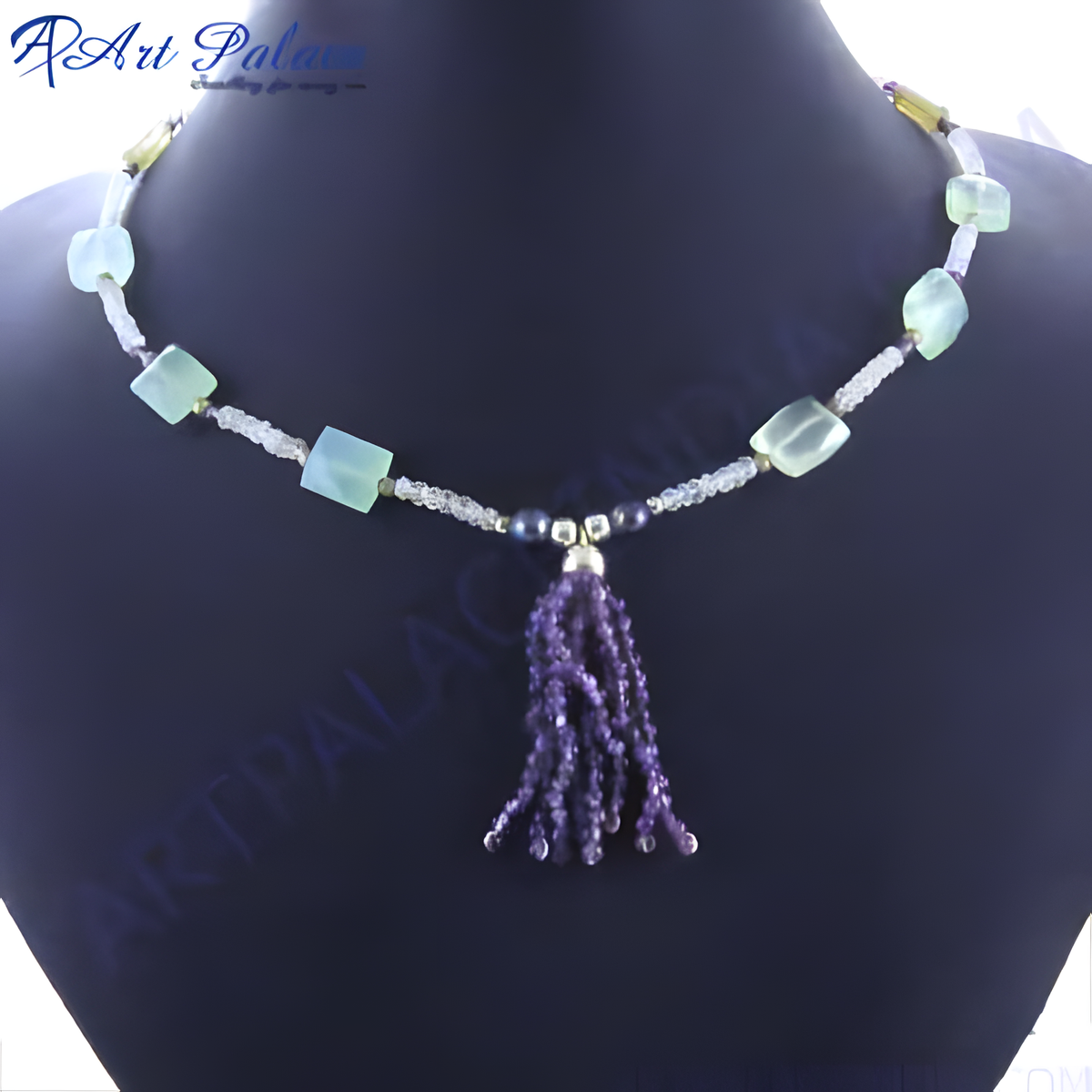 Artisan necklace featuring gemstones and a tassel pendant, perfect for women's fashion jewelry