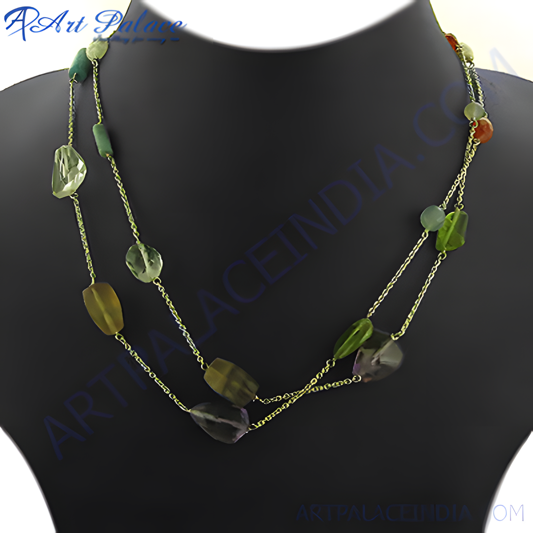 Colorful gemstone beaded necklace, featuring various semi-precious stones strung on a delicate chain, displayed on a mannequin