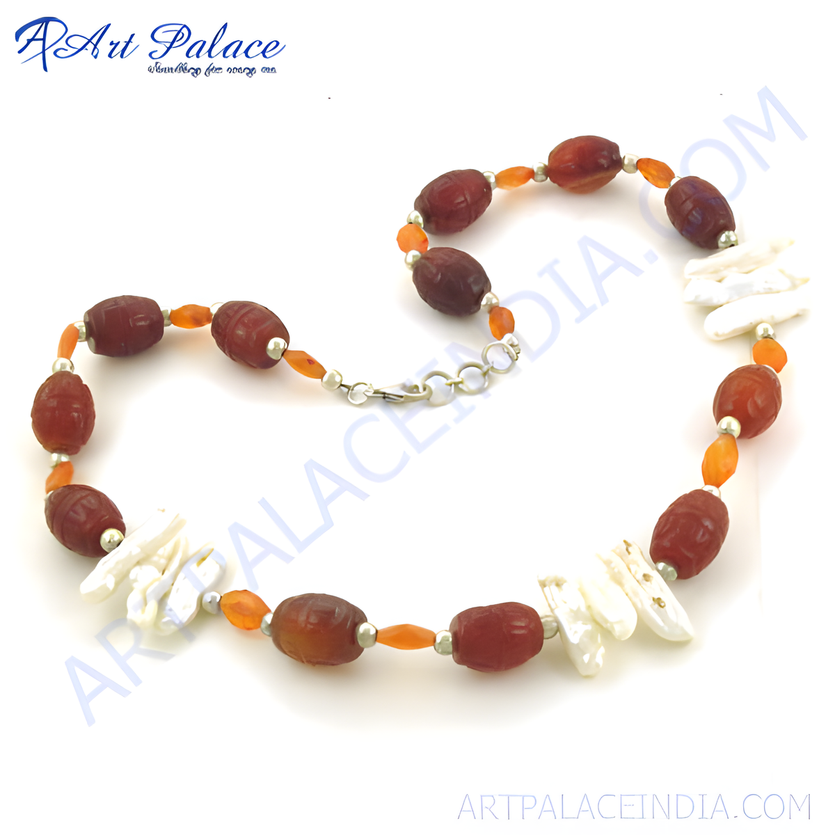 Red carnelian and freshwater pearl beaded necklace with a silver clasp, displayed on a white background