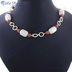 Load image into Gallery viewer, Beaded necklace featuring white beads and red beads connected by a gold plating chain, displayed on a black mannequin.
