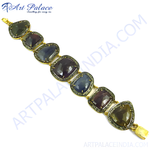 Load image into Gallery viewer, Gold plated bracelet with multi-colored sapphire gemstones.
