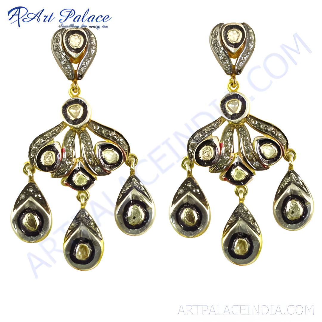 Vintage gold chandelier earrings with diamonds, featuring intricate detailing and a dangle design.