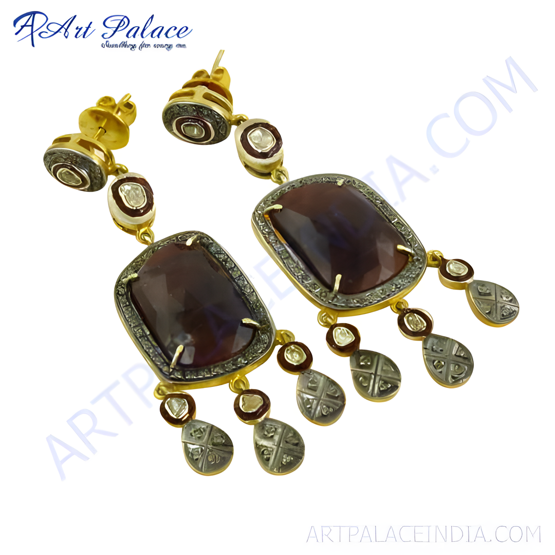 Gold vermeil drop earrings with ruby gemstones and diamond accents, elegant design.