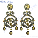 Load image into Gallery viewer, gold plating and black diamond dangle earrings with intricate design and teardrop accents.
