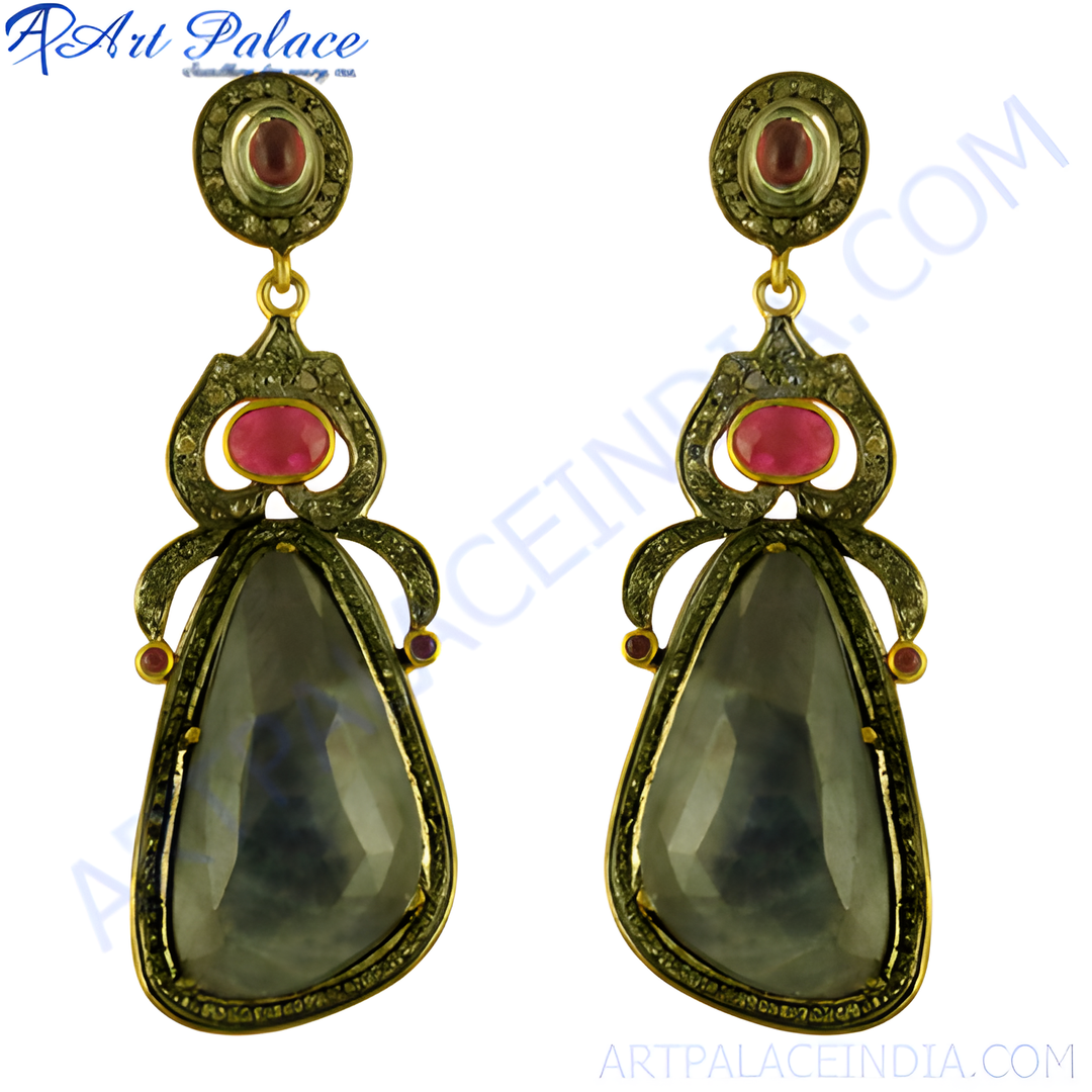 Gold-plated drop earrings with a large faceted sapphire and ruby accents.