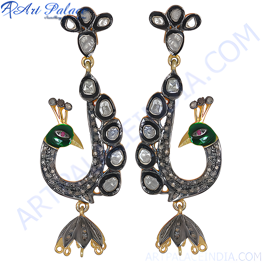 Peacock dangle earrings with green enamel detailing, diamonds, and black metal accents on a white background.