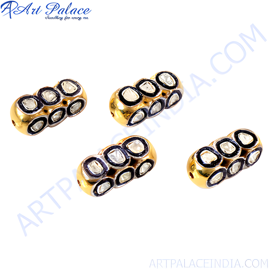 gold plating beads with black accents and set with white diamonds