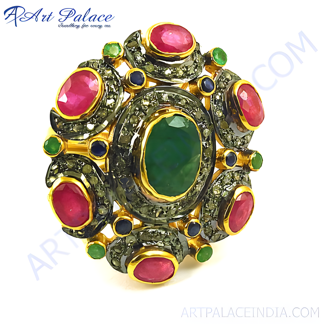 Gold ring with oval emerald center, ruby and diamond accents.