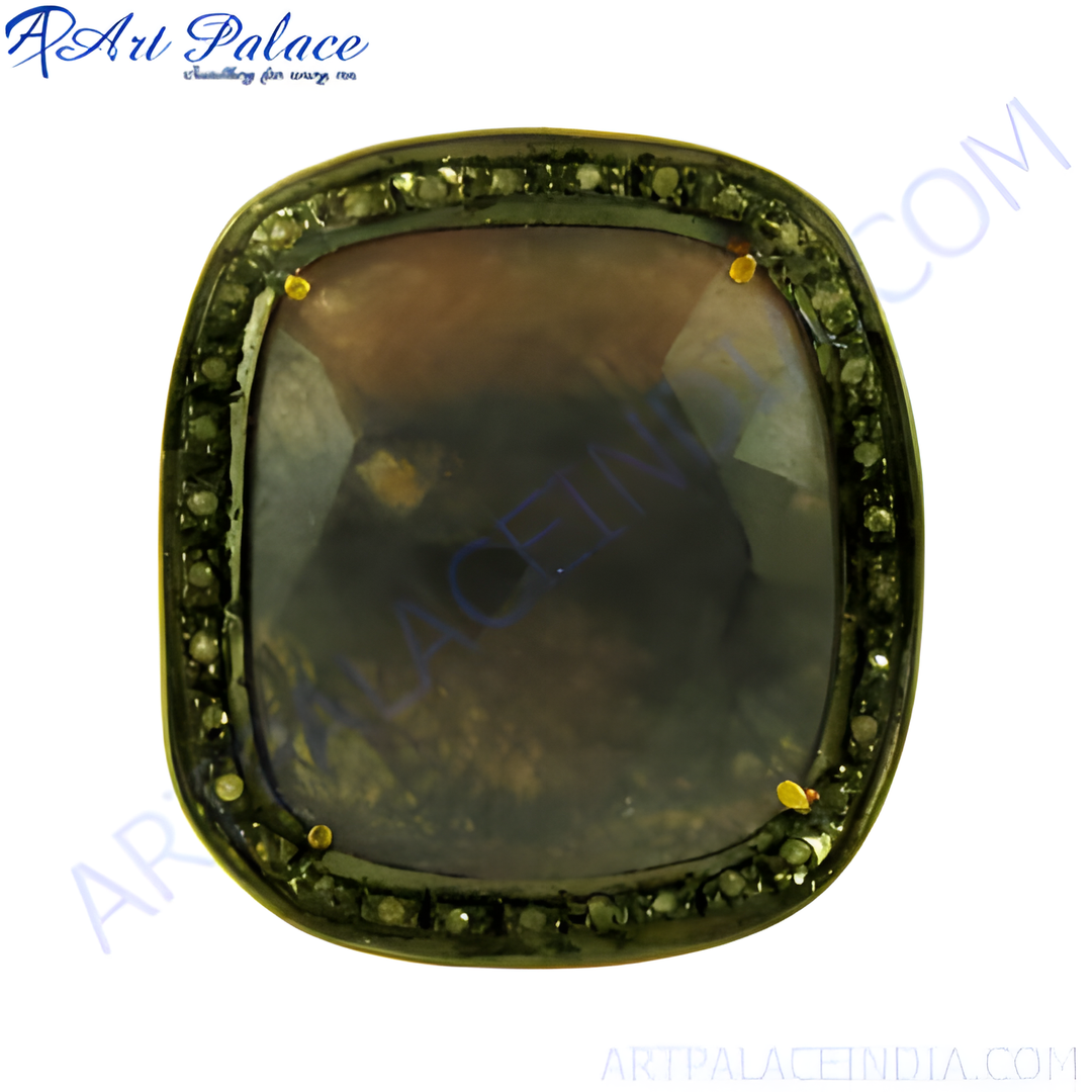 Square cut sapphire and diamond halo ring with a dark gemstone.