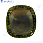 Load image into Gallery viewer, Square cut sapphire and diamond halo ring with a dark gemstone.
