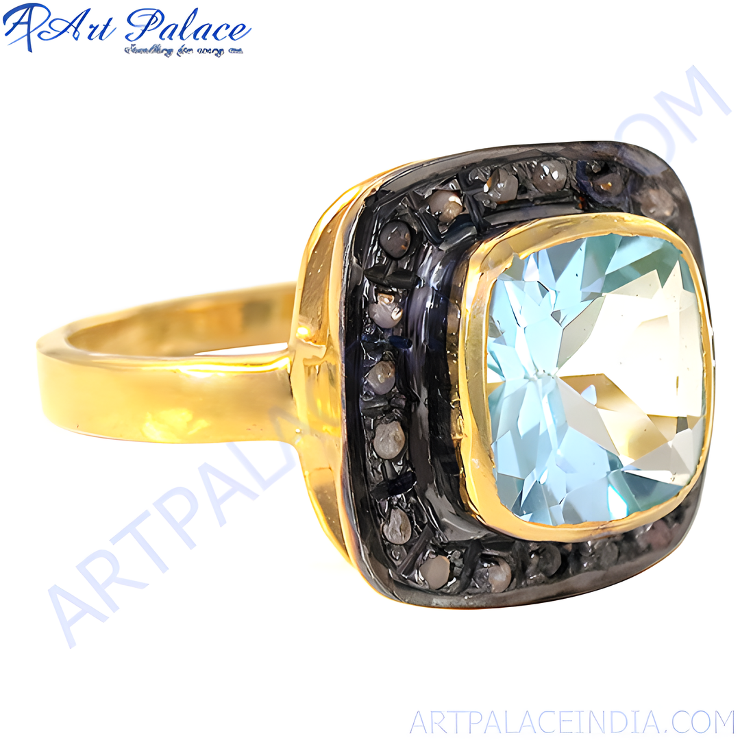 gold plating ring with a square blue topaz gemstone and diamond accents, a luxury piece of jewelry