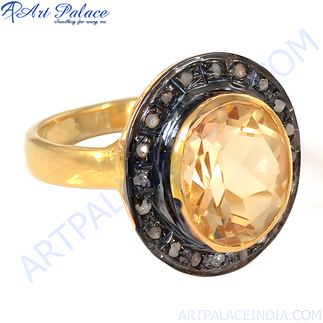 gold plating ring with a large citrine gemstone and diamond accents around the bezel.