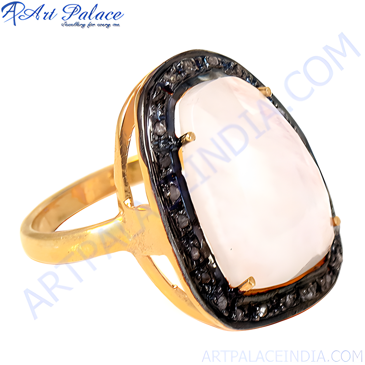 Gold plating ring with a large white gemstone surrounded by black stones, a stylish and eye catching piece