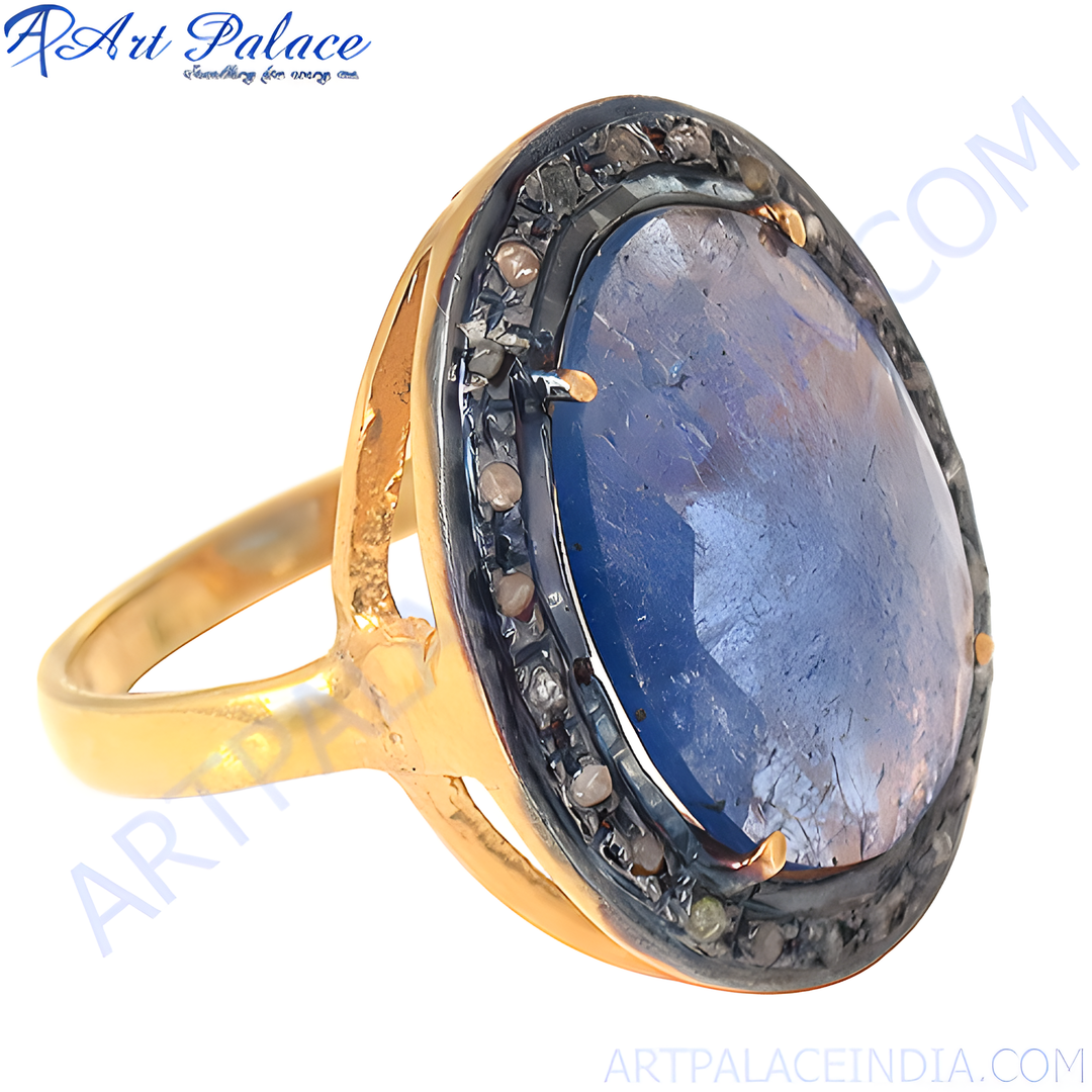 Gold halo ring with oval-cut blue sapphire center stone and diamond accents.