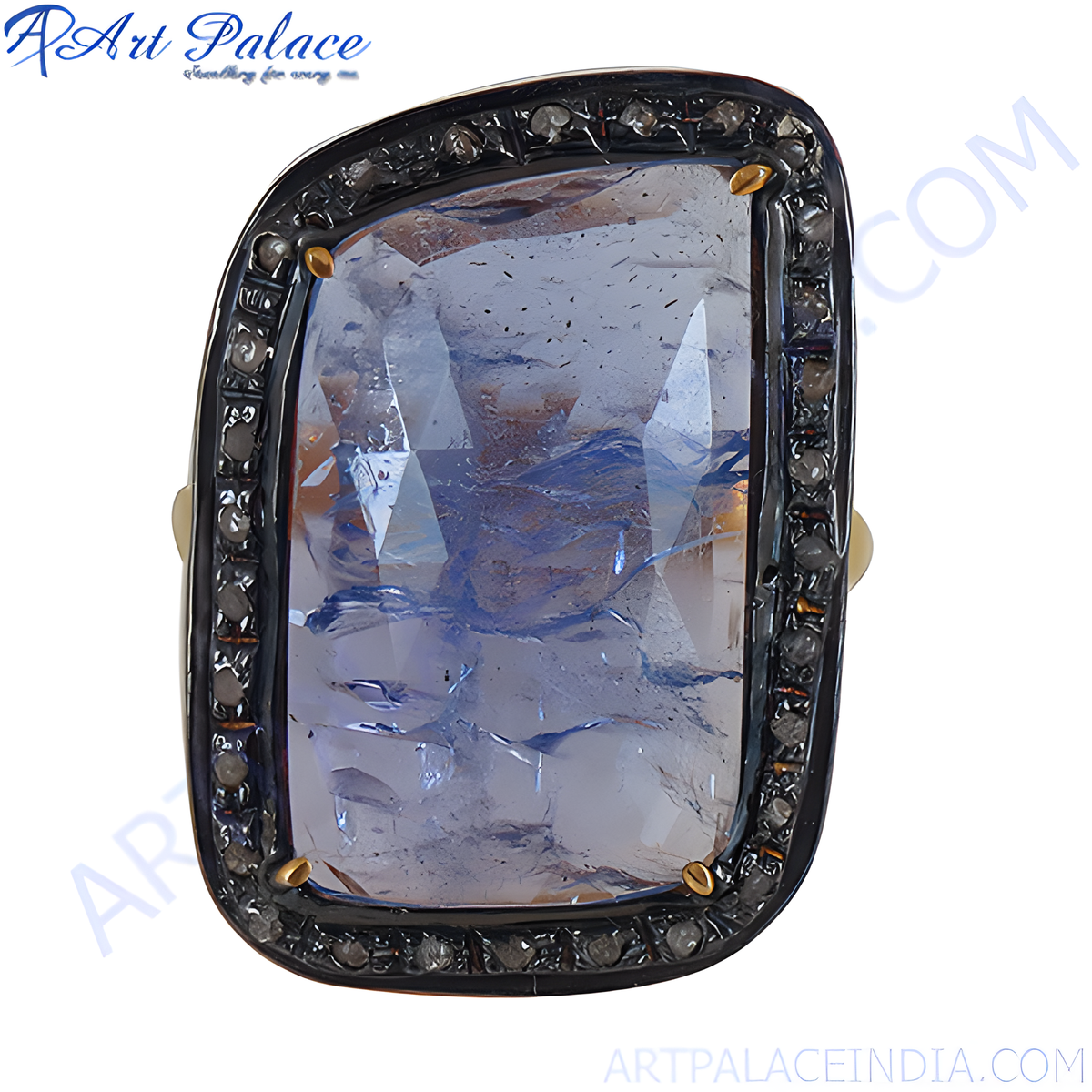 Blue sapphire and diamond ring with a unique gemstone design and black accents