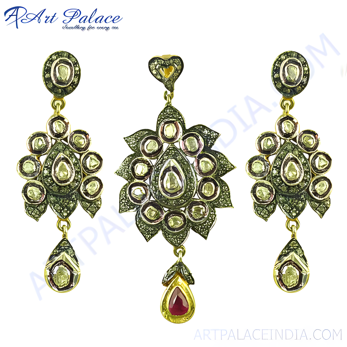 Gold diamond earrings and pendant set with intricate design and ruby accent