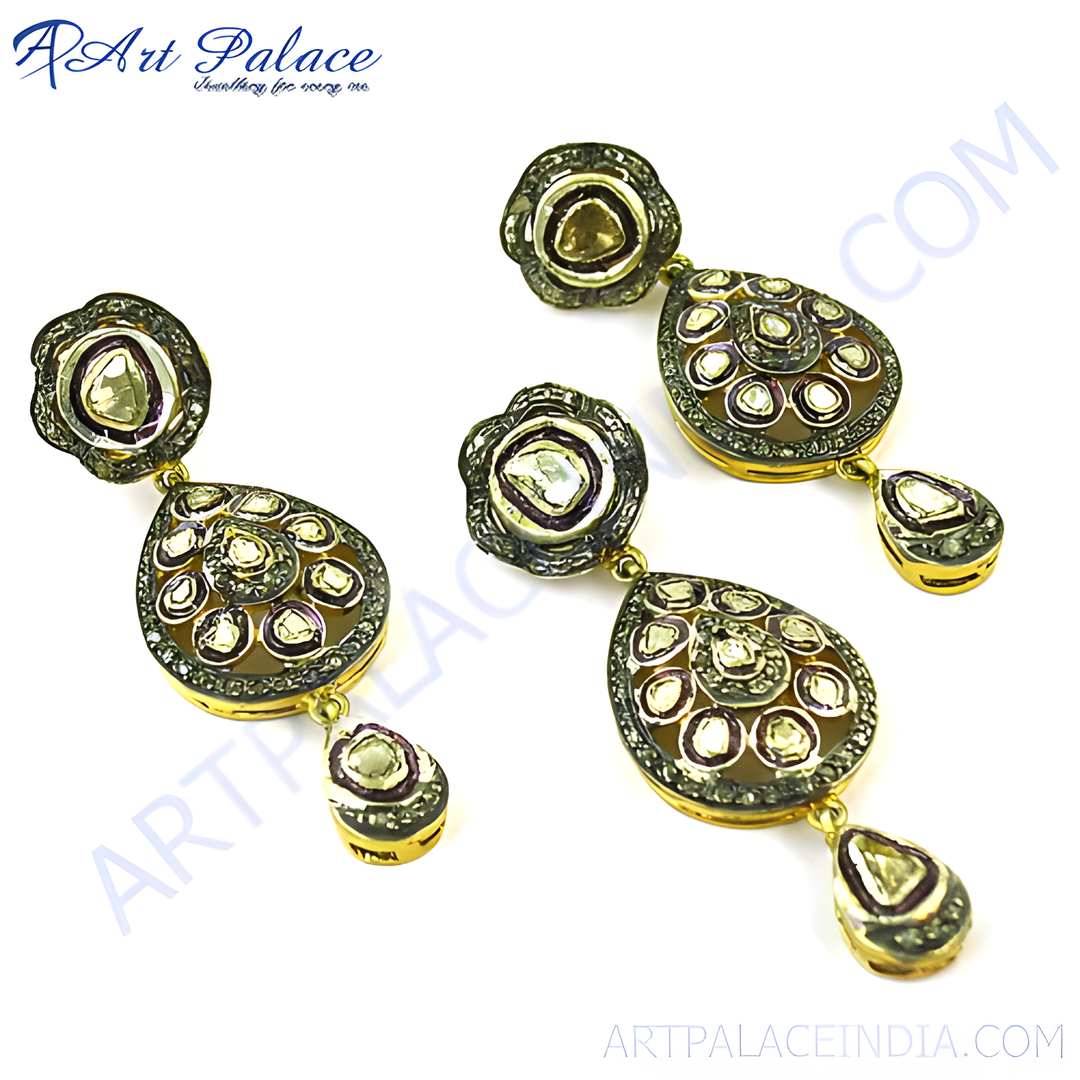 Gold teardrop earrings with diamond detailing, a luxurious and elegant design for women.