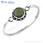 Load image into Gallery viewer, 925 sterling silver bangle bracelet with a round green gemstone. Perfect for daily wear.
