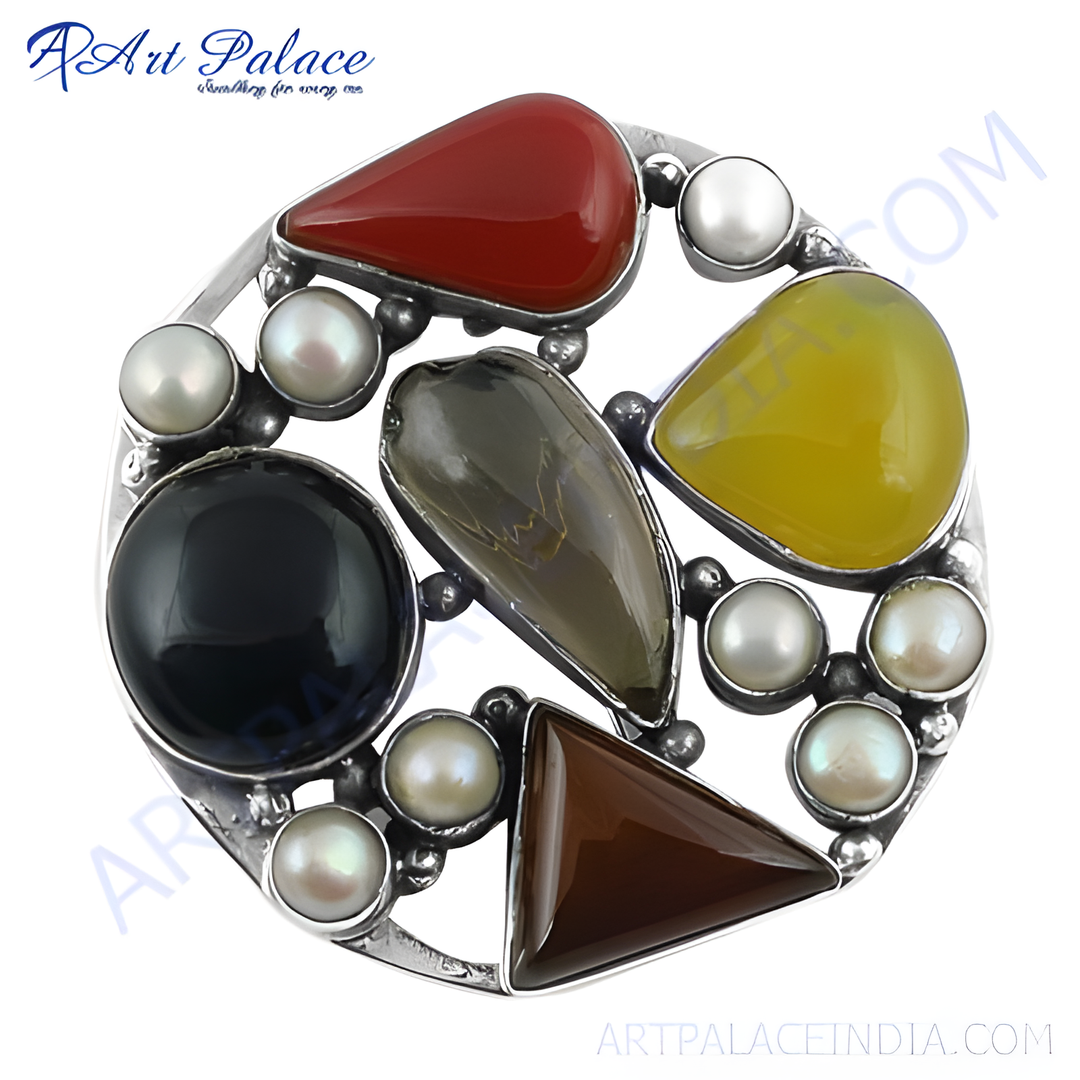 Sterling silver statement ring with multiple gemstones in red, black, yellow, and brown with white pearls.