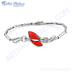Load image into Gallery viewer, Sterling silver bracelet featuring a red coral stone centerpiece. A stunning piece for women.
