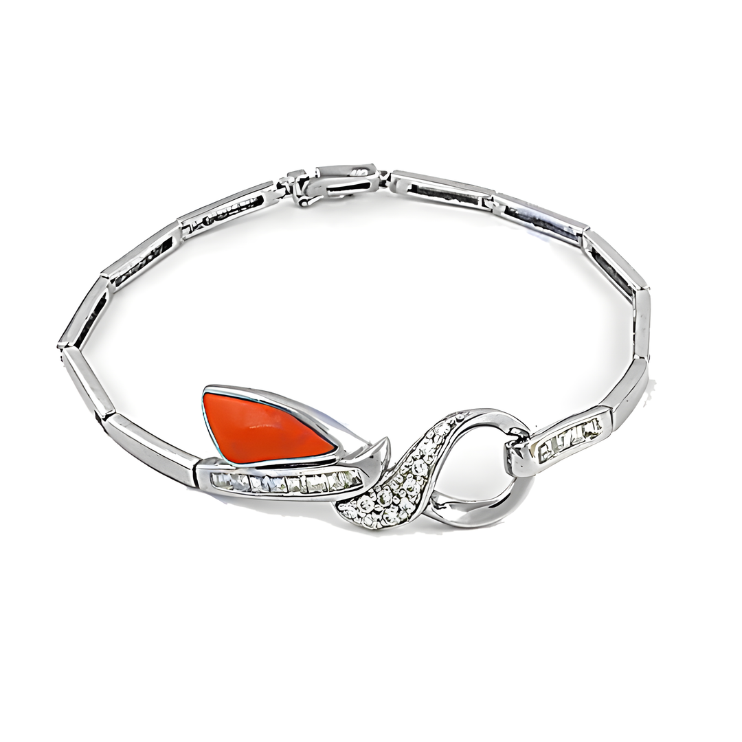 Sterling silver bracelet with coral and diamond accents on a white background.